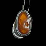 Large Sterling Silver Amber Pendant with Feather Casing