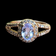 10K Rose Gold Natural Tanzanite and Diamond Split Shank Ring