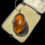 Large Sterling Silver Amber Pendant with Feather Casing