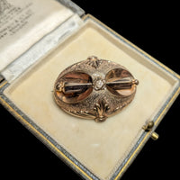 Gold Brooches