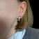 14K Yellow and White Gold Omega Back Twist Earrings with Diamonds
