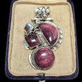 The Vintage Vault vintage sterling silver pendant featuring purple spiny oyster stones in a polished Peruvian style design.